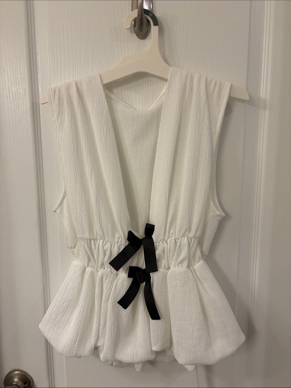 Commense White Sleeveless Peplum Dress with Black Ribbon